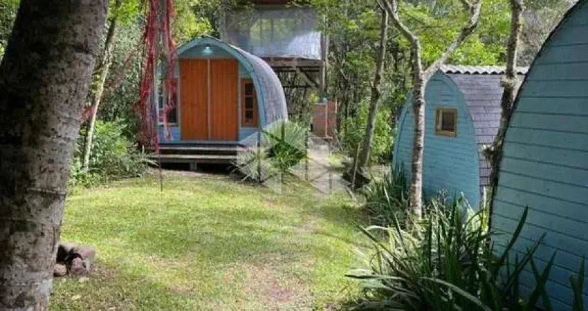 Terreno à venda, com 4 Cabanas dormitórios no Morro da Encantada em Garopaba SC com 7.690 m²