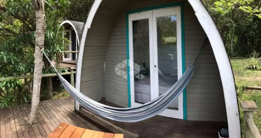 Terreno à venda em Garopaba com 4 Cabanas no Morro da Encantada
