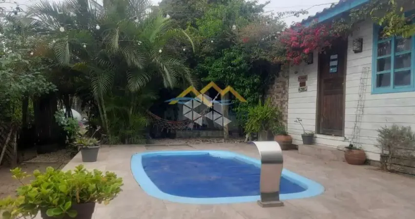 Casa com 4 quartos, 2 vagas, 336,55m² de área total na Praia do Rosa - Imbituba SC