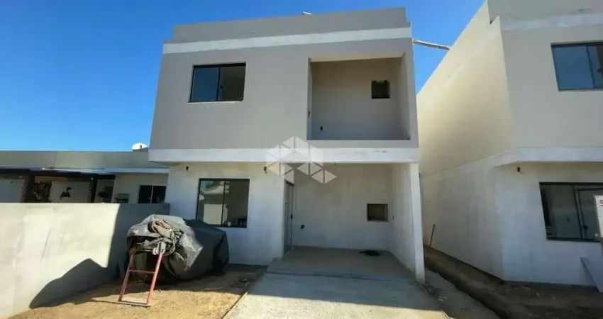 Casa com 2 dormitórios (suítes), 2 vagas, com 86,82 m² de área construída no bairro Encantada em Garopaba SC