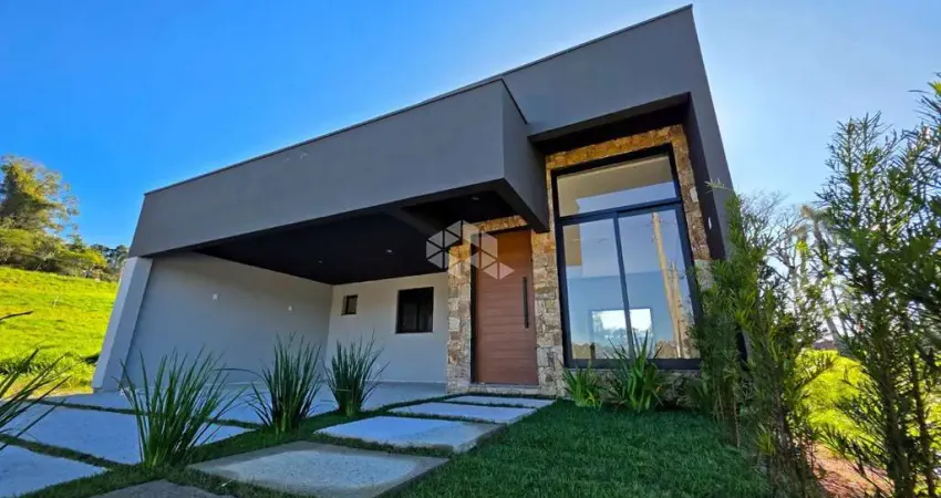 Casa de 3 dormitórios, uma suíte, duas vagas, no bairro Ermo em Guaíba-RS