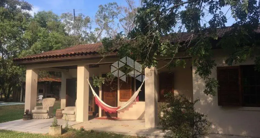 Sítio no Guaíba Country Clube - com Casa, Piscina e muita área arborizada - Parque Eldorado