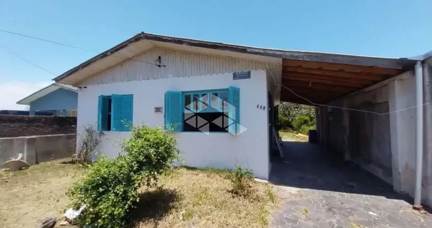 Casa à venda com 3 dormitórios, 2 vagas, energia solar, na Alegria em Guaíba