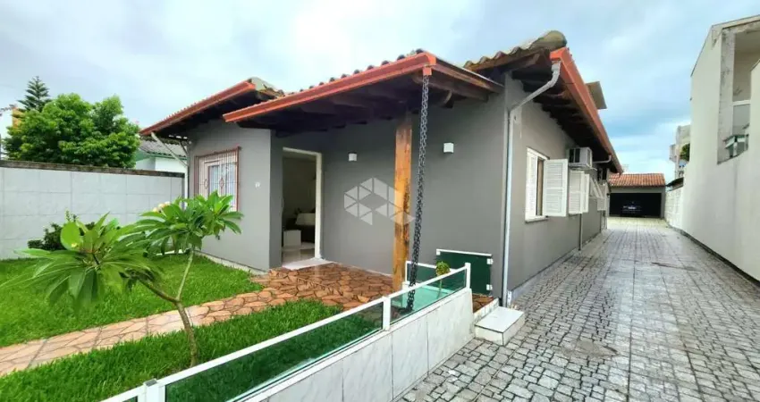 Linda casa com 3 dormitórios no centro de Eldorado do Sul por R$750.000,00