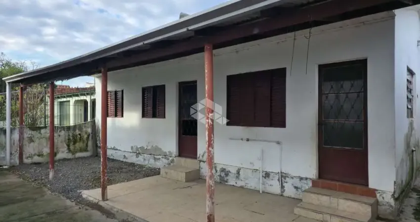 Terreno à venda com 3 casas no bairro estância velha em canoas, 352m2 com 3 casas.