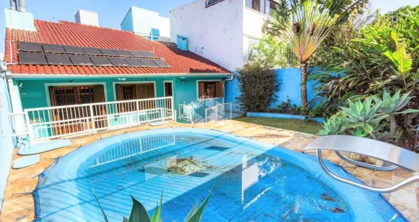 Casa em condomínio fechado com 4 quartos à venda na Rua Presidente Juarez, 510, São Sebastião, Porto Alegre