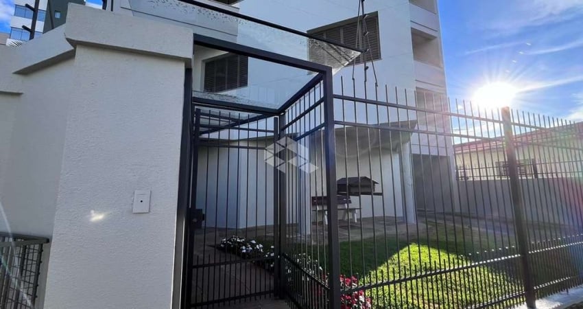 Apartamento com garagem e 2 dormitórios no centro de Vacaria