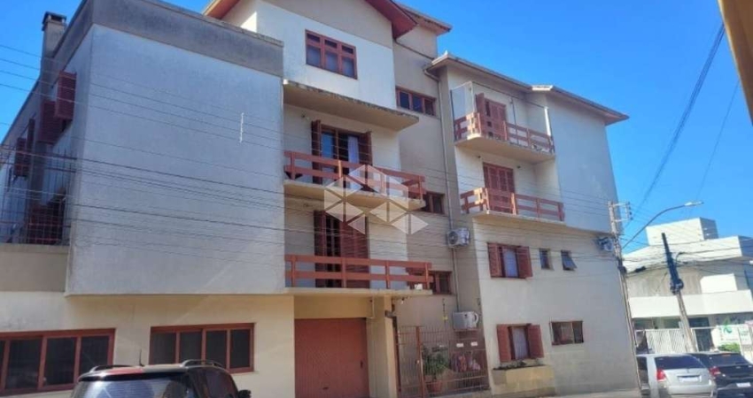 Apartamento com 3 dormitórios e 2 vagas de garagem no centro de Vacaria!