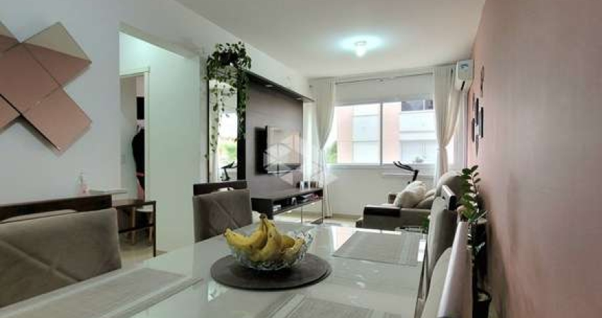 Apartamento semi mobiliado de 02 dormitórios com 50m² privativos com vaga próximo ao Partenon