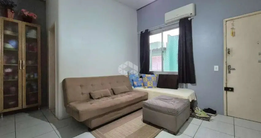 Apartamento de 1 dormitório e 1 vaga de garagem, no bairro Humaitá, em Porto Alegre.