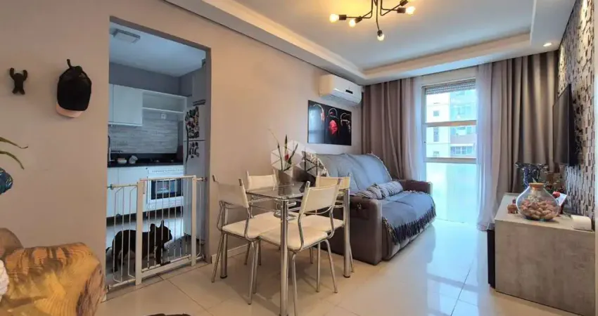 Apartamento de 1 dormitório e 1 vaga de garagem, no bairro Humaitá, em Porto Alegre.