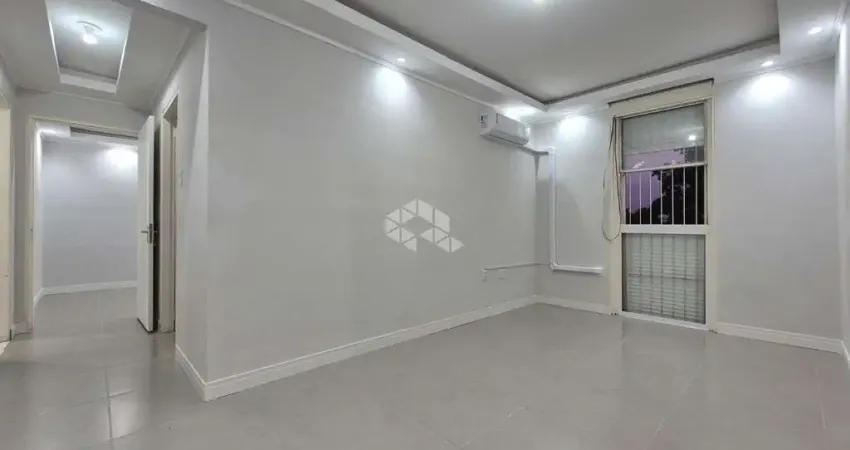 Apartamento de 2 dormitórios e 1 vaga de garagem, no bairro Humaitá, em Porto Alegre.