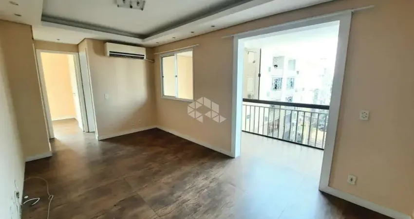 Apartamento de 2 dormitórios, sacada integrada e churrasqueira no bairro Humaitá, Porto Alegre