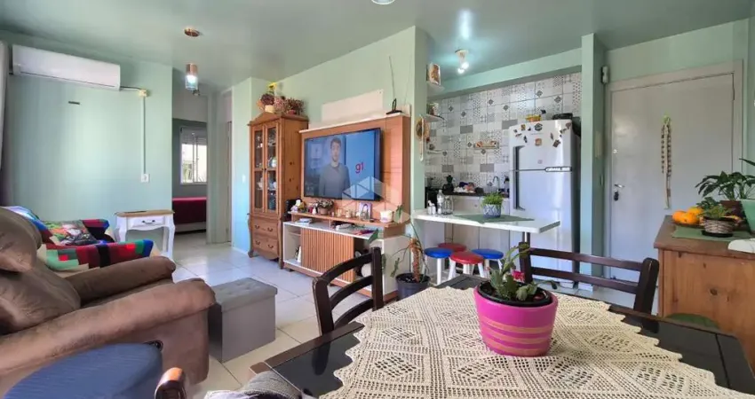 Apartamento de 2 dormitórios e 1 vaga de garagem, no bairro Humaitá, em Porto Alegre.