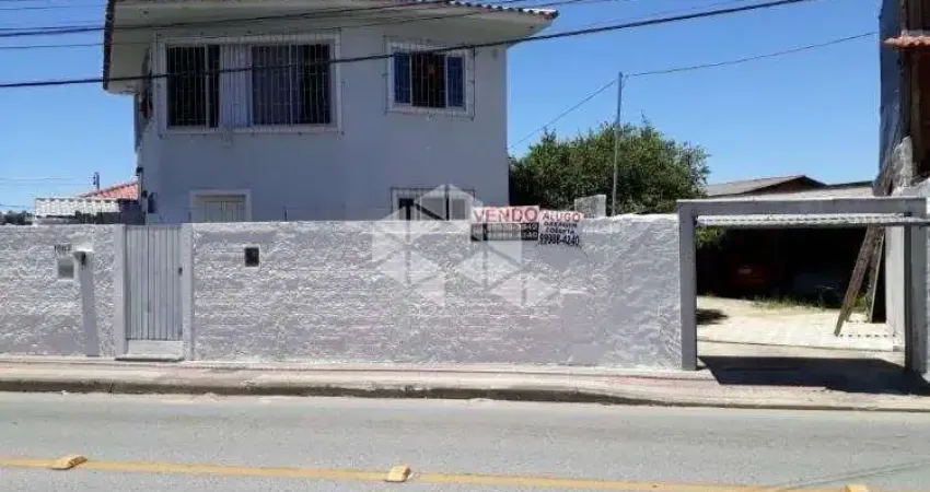 Casa de alvenaria com terreno amplo e viabilidade comercial em forquilinhas