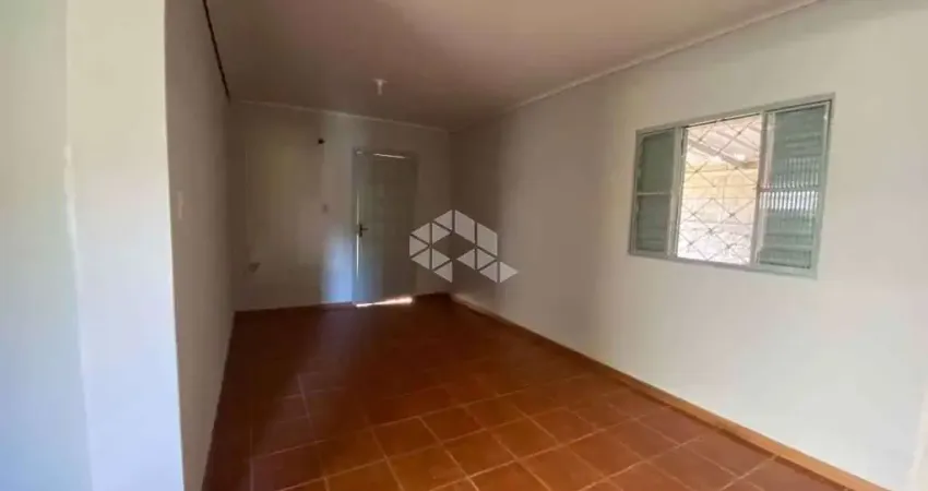 Casa plana com 2 dormitórios, sala, 1 banheiros 1 vaga para automóvel.