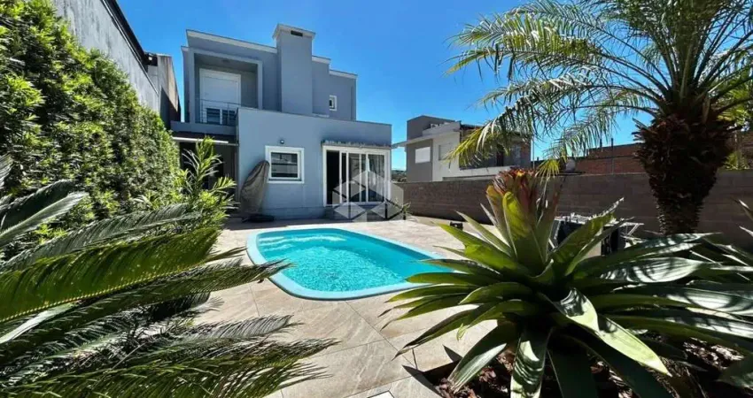 Casa com piscina, suíte e garagem para 5 carros em estância velha