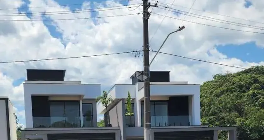 Geminado duplez alto padrão três quartos sendo duas suítes bairro três rios do norte jaraguá do sul