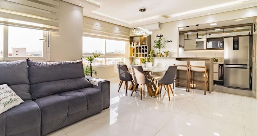 EXCELENTE 3 DORMITÓRIOS TRANSFORMADO EM 2 COM LIVING ESTENDIDO NO BAIRRO NAVEGANTES
