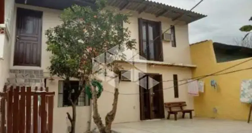 Casa com 3 quartos à venda na Rua Tamoios, 112, Parque Índio Jari, Viamão