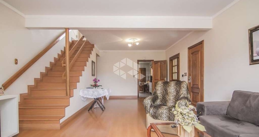 Casa com 2 dormitórios com 2 vagas, no bairro Partenon em Poa/Rs.