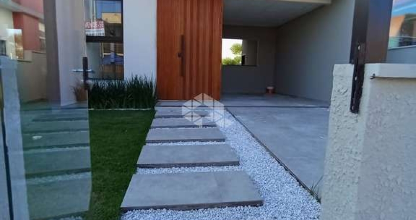 CASA À VENDA TÉEREA - 2 DORMITÓRIOS,  SENDO 1 SUITE COM GARAGEM