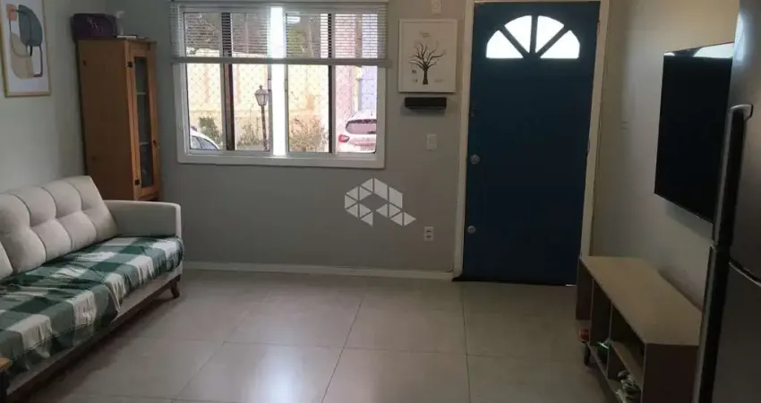 CASA EM CONDOMÍNIO 2 QUARTOS E 1 VAGA DE GARAGEM NO BAIRRO CAVALHADA