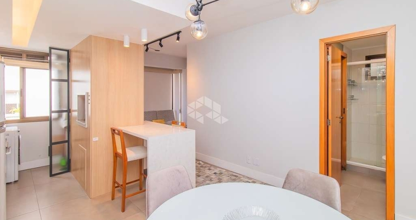 Apartamento 1 dormitório com garagem , elevador, suíte , parte alta do bairro