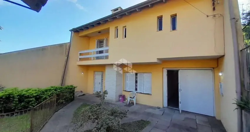 Casa em condomínio fechado com 4 quartos à venda na Rua Carlos Ferreira, 130, Teresópolis, Porto Alegre