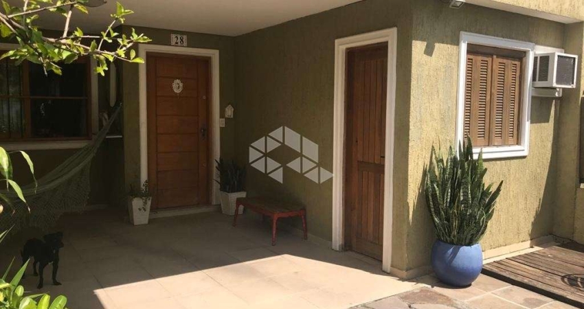 Casa em condomínio fechado com 3 quartos à venda na Rua Manacá, 28, Hípica, Porto Alegre