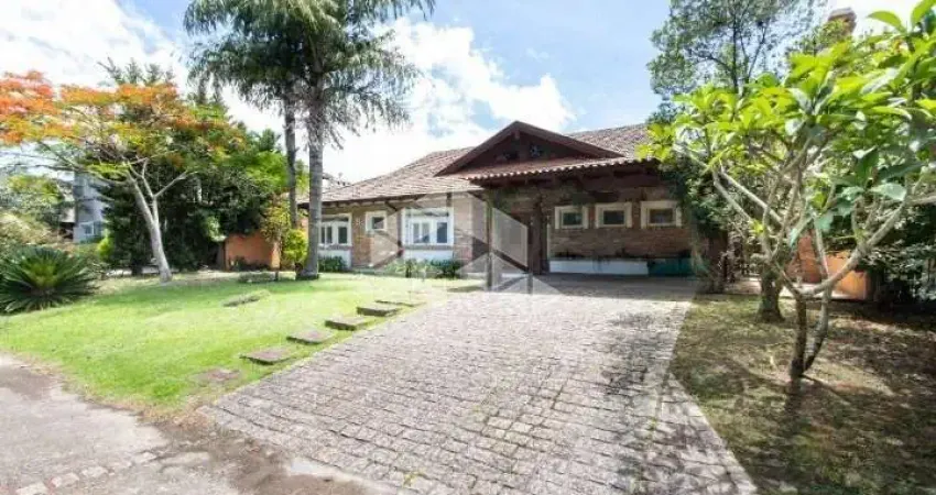 Casa em condomínio fechado com 3 quartos à venda na Avenida Juca Batista, 8000, Belém Novo, Porto Alegre