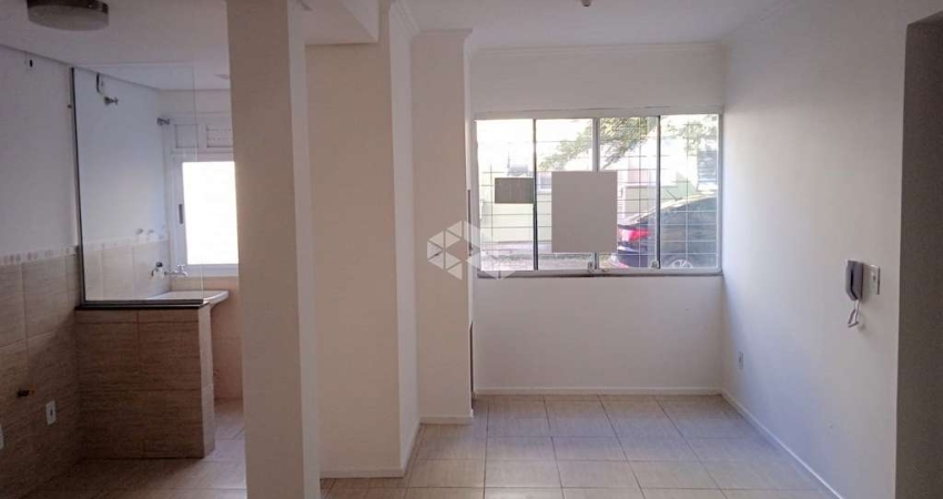 Apartamento com 2 dormitórios e box escriturado no Guarujá