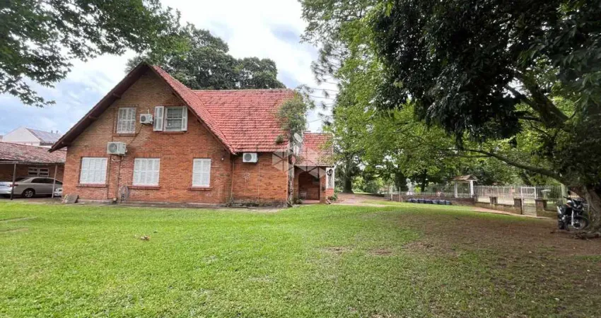 Casa com 4 quartos à venda na Rua Chavantes, 429, Vila Assunção, Porto Alegre