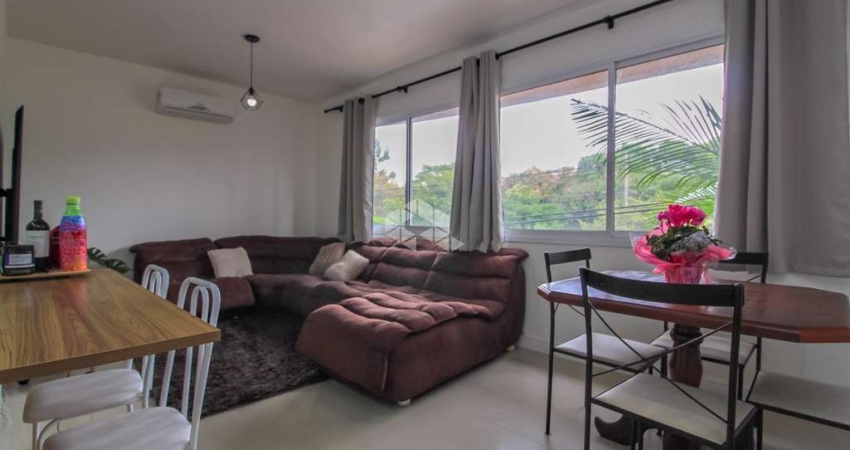 Apartamento com 2 dormitórios, sendo 1 suíte e 1 vaga no bairro Jardim Botânico