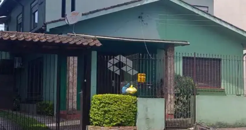 Casa com 6 dormitórios, 1 suite master, 4 banheiros, 5 vagas. Bairro Rio Branco em Novo Hamburgo. Aceita financiamento bancário.