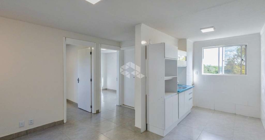 Apartamento reformado, 2 dormitórios, cozinha integrada com sala de estar, estacionamento, quiosque, bairro Santo Afonso, em Novo Hamburgo.