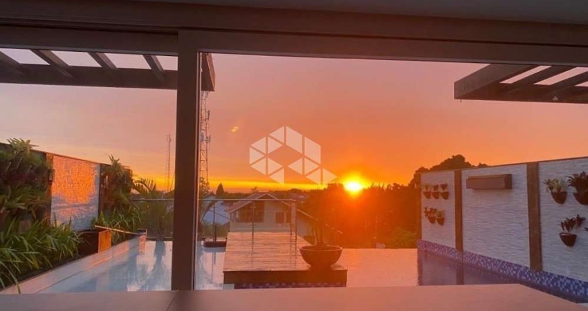 CASA COM 4 SUÍTES, PISCINA COM BORDA INFINITA E VISTA PARA O GUAÍBA, NO BAIRRO IPANEMA, ZONA SUL DE PORTO ALEGRE