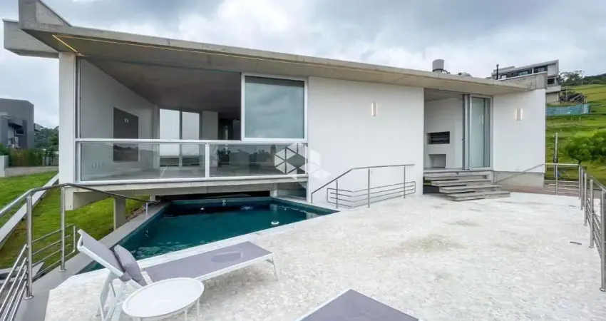 Casa de alto padrão, com 4 dormitórios, sendo 4 suítes, no condomínio alphaville em porto alegre