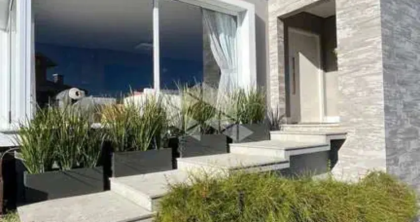 Casa em condomínio à venda com 3 suítes, 253m² e 2 vagas no alphaville porto alegre.