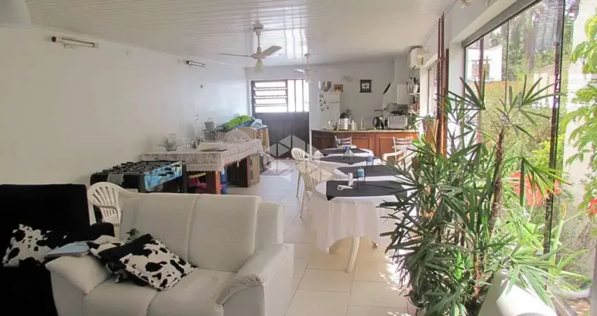 Casa com 4 quartos à venda na Avenida Itaqui, 366, Petrópolis, Porto Alegre