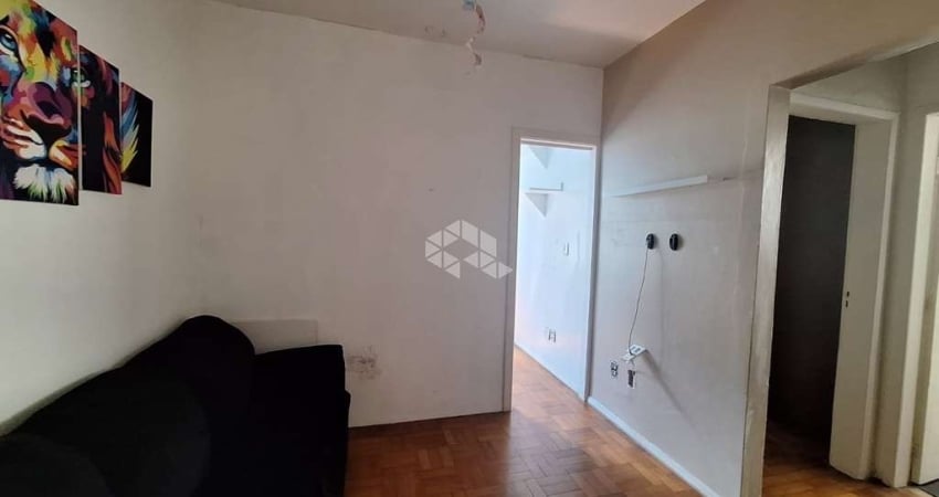 Apartamento de 1 quarto,  bairro Santana. Possui living, cozinha, banheiro social e 1 vaga de garagem coberta escriturada