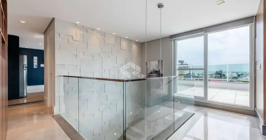 Cobertura com 3 suites e 3 vagas com vista para o Guaíba no bairro Menino Deus.