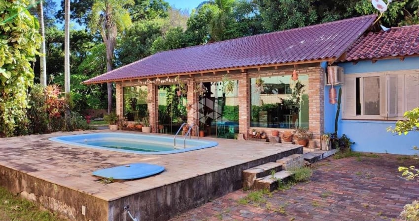 Casa com 292 m² e 4 quartos à venda no bairro Tristeza
