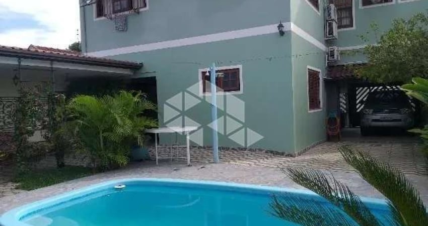 Casa com 4 quartos à venda na Rua Doutor Telmo Vergara, 556, Partenon, Porto Alegre