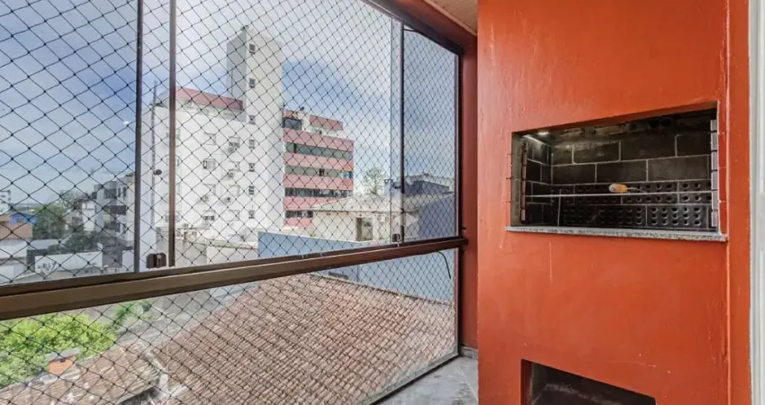 Apartamento de 2 dormitórios. sacada com churrasqueira. garagem coberta em cachoeirinha