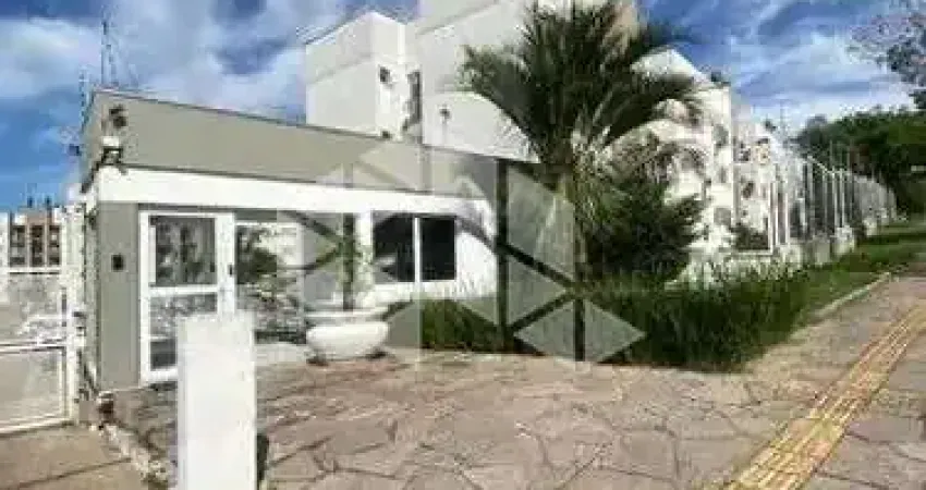 Apartamento térreo com 60 m², 2 dormitórios, churrasqueira e 1 vaga na Cavalhada