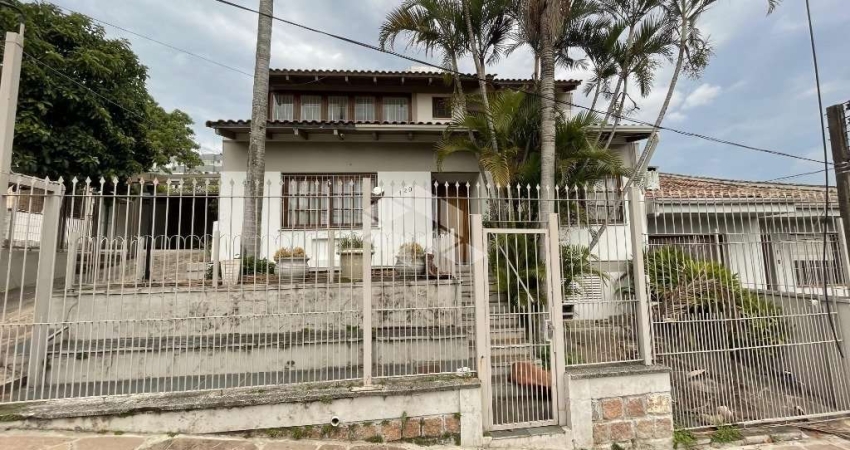 Casa com 4 quartos à venda na Rua João Bonuma, 110, Coronel Aparício Borges, Porto Alegre