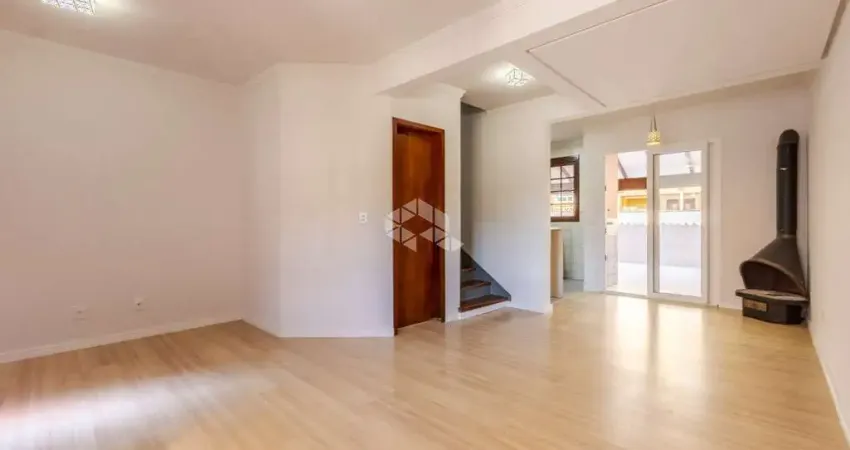 Casa em condomínio fechado com 3 quartos à venda na Avenida Edgar Pires de Castro, 1286, Hípica, Porto Alegre