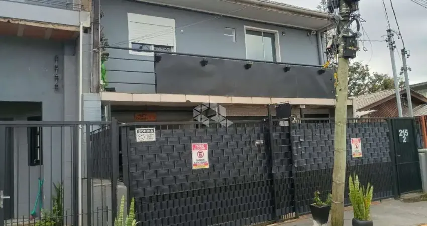 Casa com 3 quartos à venda na Travessa Escobar, 215, Camaquã, Porto Alegre