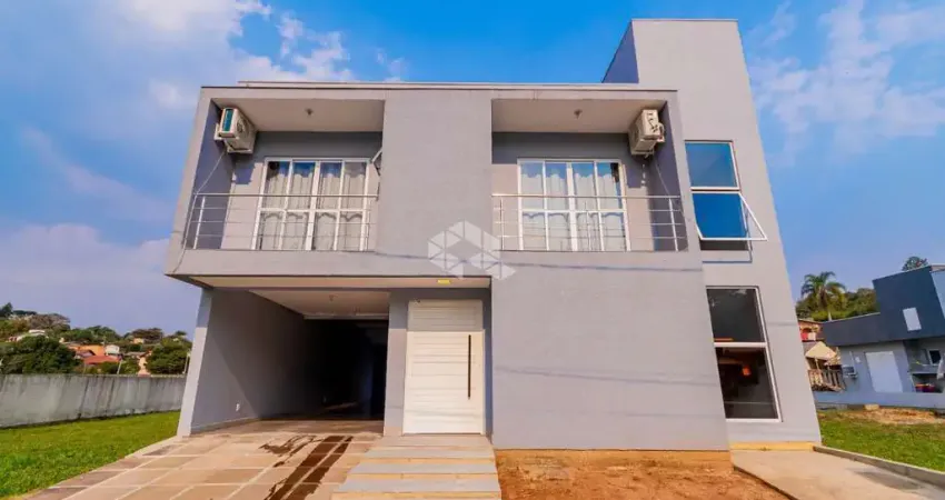 Casa em condomínio fechado com 3 quartos à venda na Rua Tenente Mário Telles Ferreira, 21, Tarumã, Viamão
